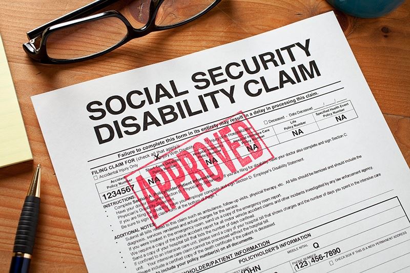 A Social Security Disability Claim application form that has been marked as Approved.