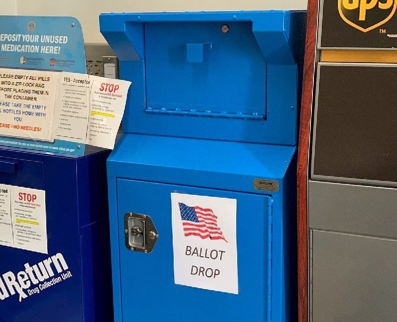 A blue, mailbox-style drop box for mail-in and absentee ballots just inside the Courthouse.