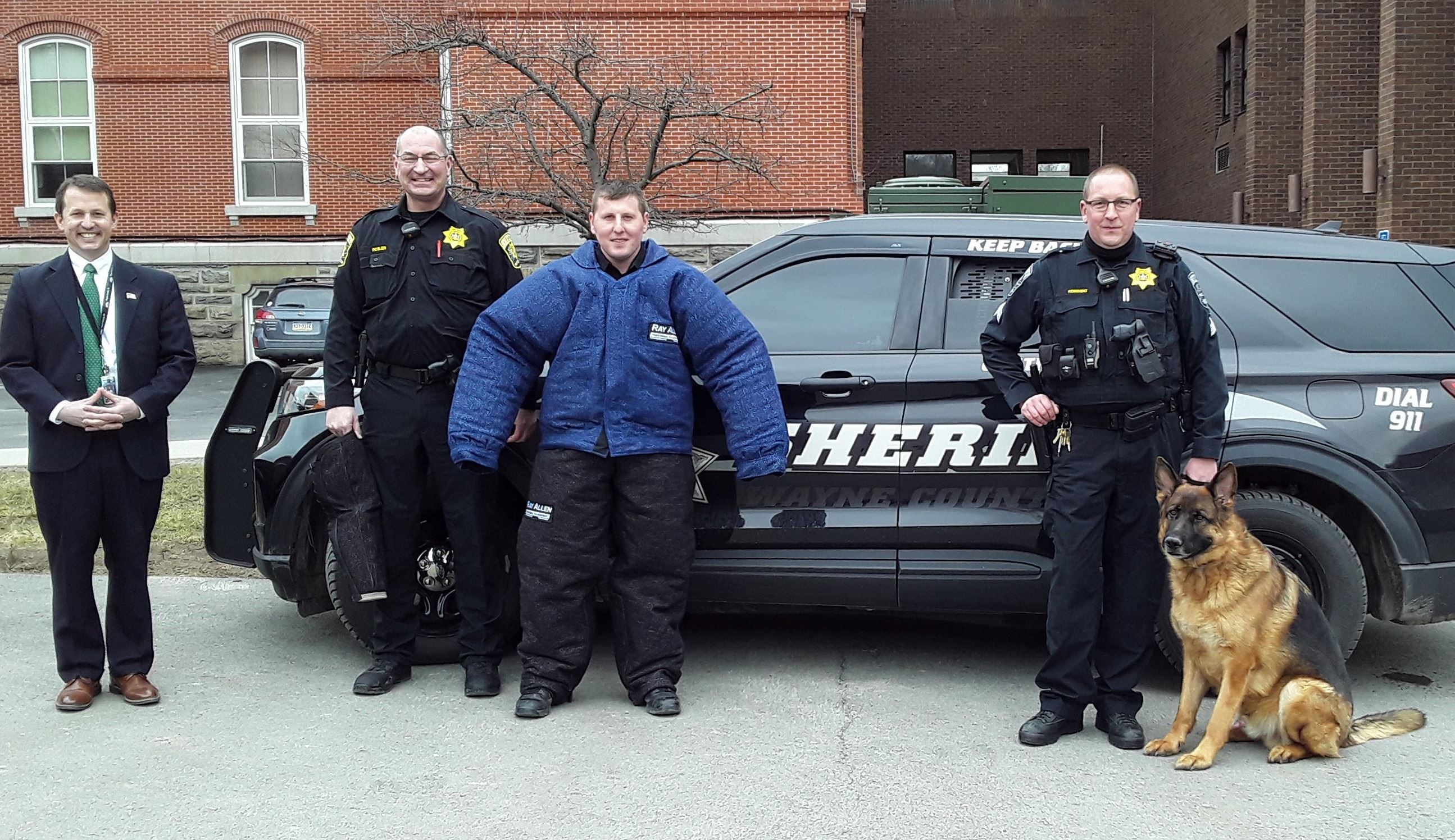 DA A.G. Howell and Sheriff Chris Rosler with Deputies Nick Corazzi, Ron Kominski & K9 Manfred