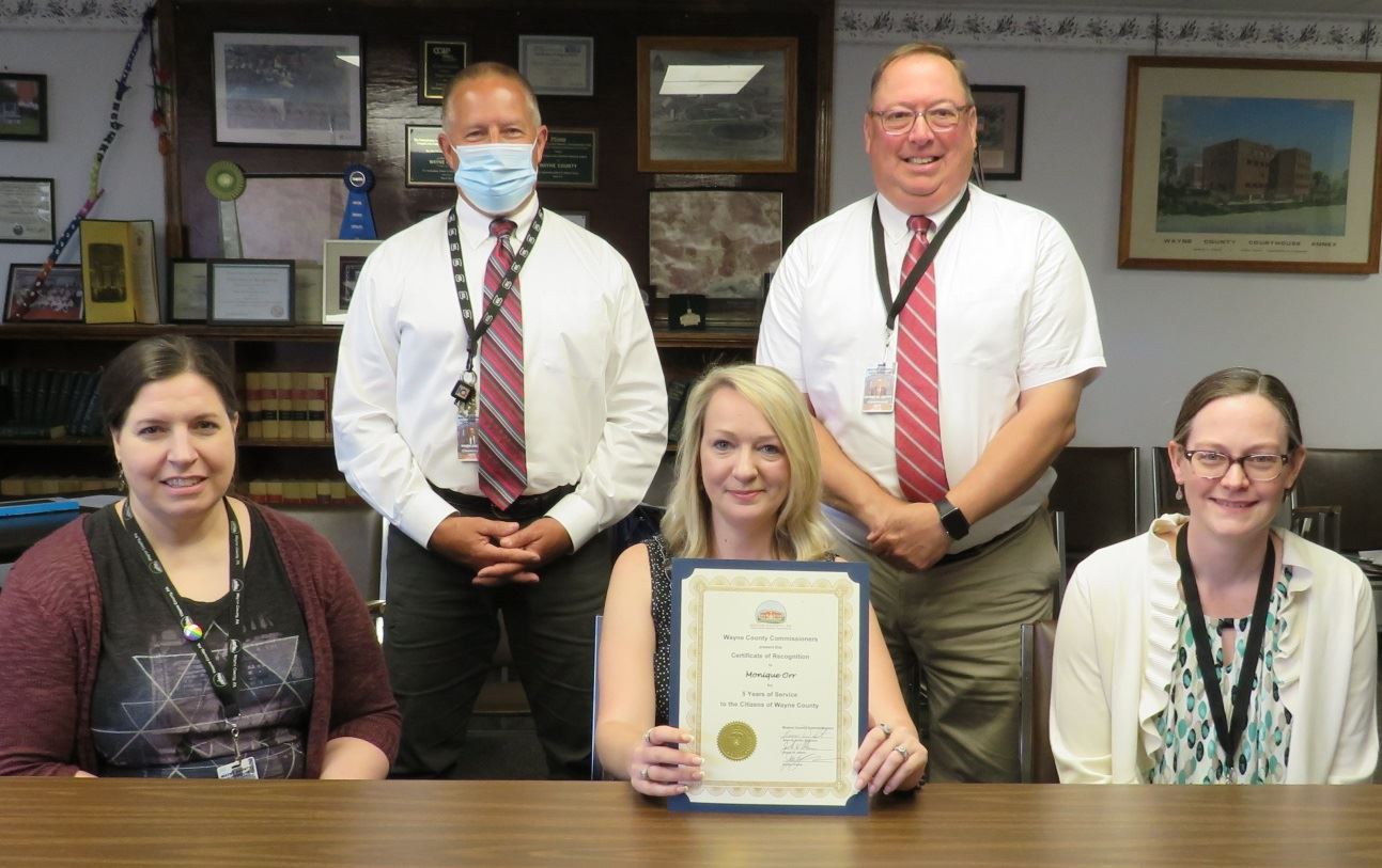 Monique Orr  with the Commissioners marking five years of service to the people of Wayne County.