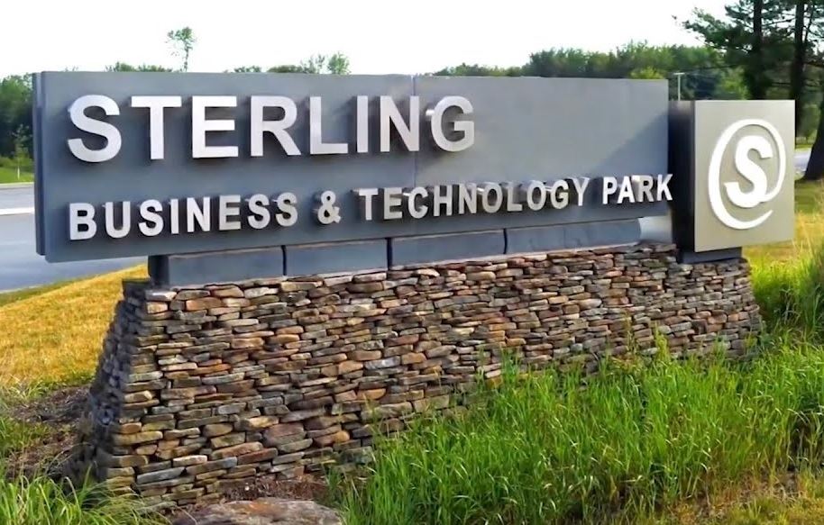 An image of the entrance sign for the Sterling Business & Technology Park on Routes 191/196.