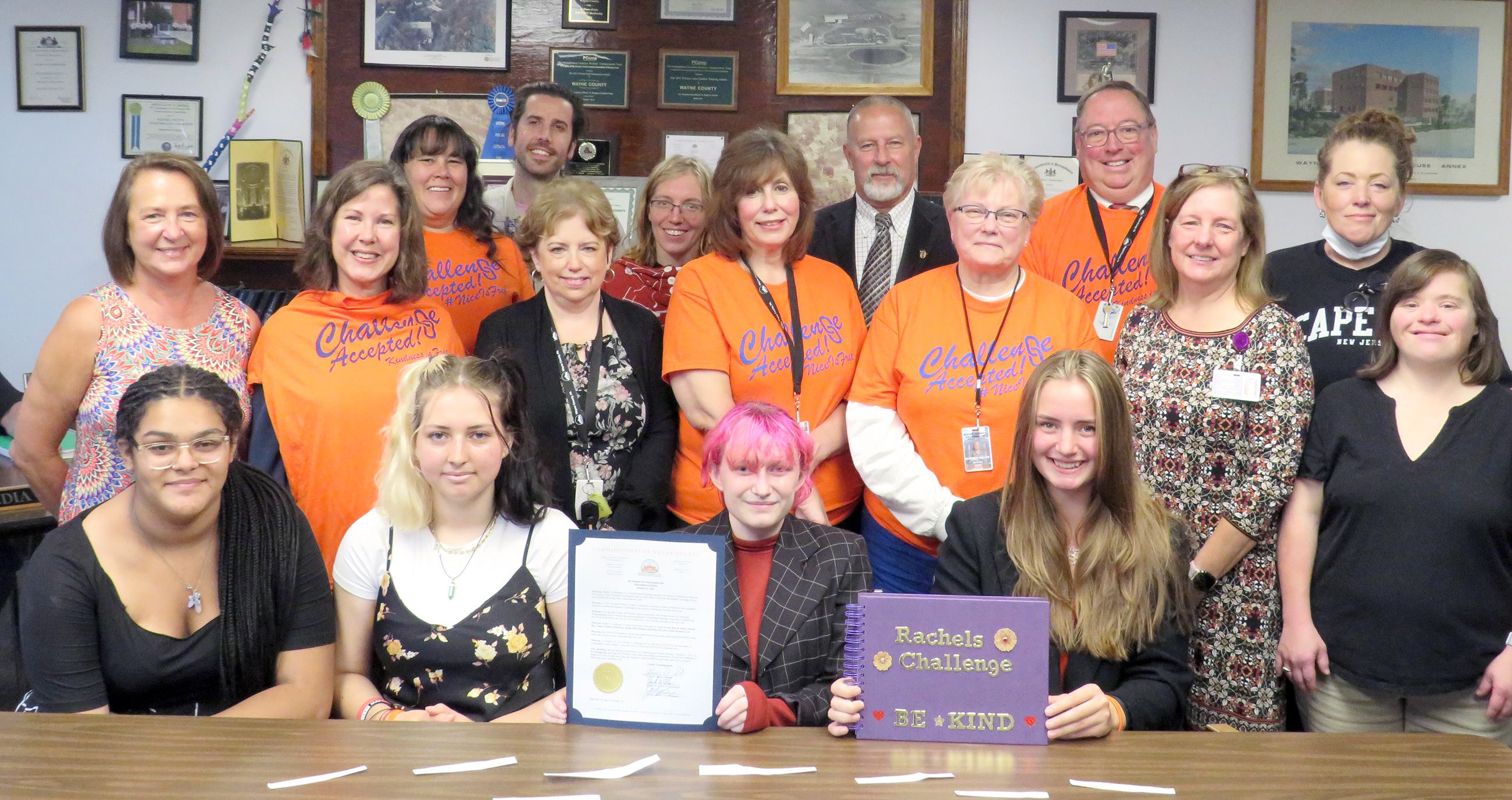 Students from Wallenpaupack join the Commissioners and others for a proclamation for Go Orange Day.