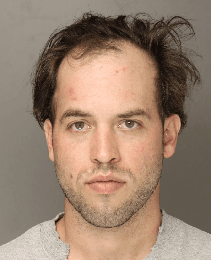 A headshot of Michael Yzkanin